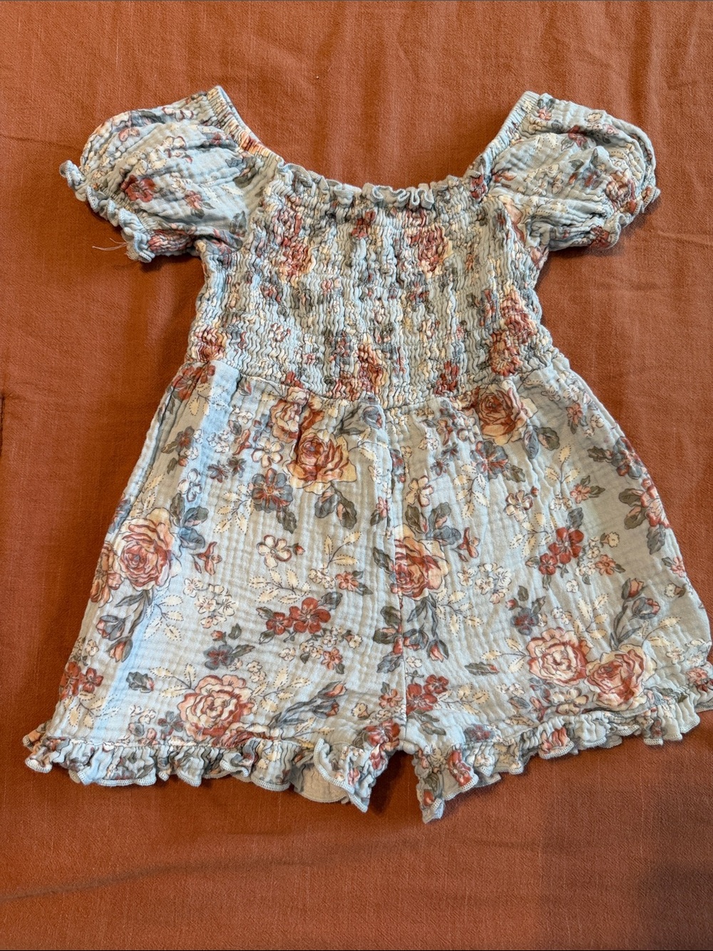 Floral Smocked Girls' Romper in Light Blue and Rose